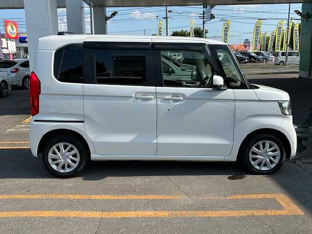 ホンダ Ｎ ＢＯＸ L 道東・釧路十勝 2023(令5)年 1.3万km プラチナホワイトパール ４WD/ホンダセンシング/純正ナビ/CD/DVD/BT/MSV/フルセグTV/バックカメラ /両側パワースライドドア/前席シートヒーター/ミラーヒーター/LEDヘッドライト/サイドエアバック/カーテンエアバック/オートライト/ドアバイザー