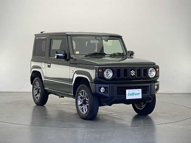 スズキ ジムニー XC 長野県 2023(令5)年 2.2万km ジャングルグリーン 4WD/社外ナビ（型番:CN-BR310B)/（CD/BL/FM/AM）/バックカメラ/ターボ/ETC/ドライブレコーダー（前）/クルーズコントロール（追従なし）/盗難防止装置/シートヒーター（前席）/ミラーヒーター/LEDヘッドライト/オートライト/フォグランプ/純正アルミホイール/社外マット/スマートキー