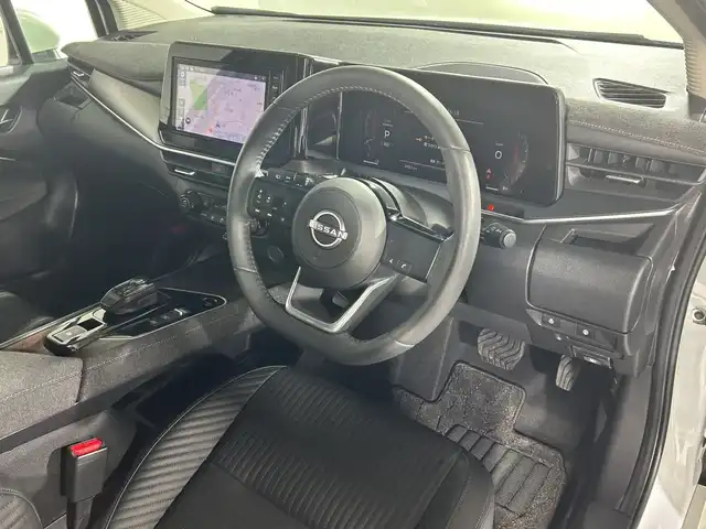 日産 オーラ G レザーエディション 神奈川県 2024(令6)年 0.4万km ピュアホワイトパール 純正9インチナビ/・BT/フルセグTV/SD/USB/AM/FM/アラウンドビューモニター/レザーシート/デジタルインナーミラー/ETC/純正前後ドライブレコーダー/電動サイドブレーキ/オートブレーキホールド/ECO/SPORTモード/EVモード/シートヒーター(D/N)/革巻きステアリング/ステアリングスイッチ/Autoライト/ステアリングヒーター/インテリジェントキー/プッシュスタートボタン/LEDヘッドライト/フォグランプ/電動格納ミラー/ウィンカーミラー/シートリフター/純正フロアマット/純正アルミホイール/純正ドアバイザー