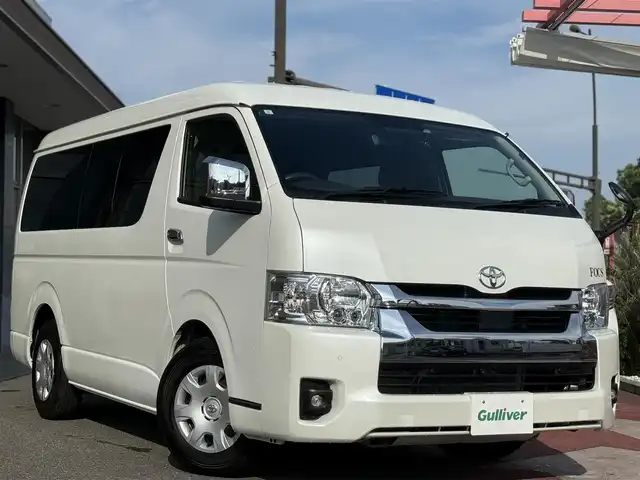 トヨタ ハイエース GL 香川県 2024(令6)年 0.4万km ホワイトパールクリスタルシャイン キャンピングカー/ストラーダSDナビ/フルセグ/CD/DVD/BT/デジタルインナーミラー/パノラミックビューモニター/セーフティセンス/プリクラッシュ/レーンキープ/オートハイビーム/シンク/ベットキット/サブバッテリー/外部１００Ｖ充電装置/電装配電盤/走行充電装置/100Vコンセント/照明/テーブル/カーテン/ＥＴＣ