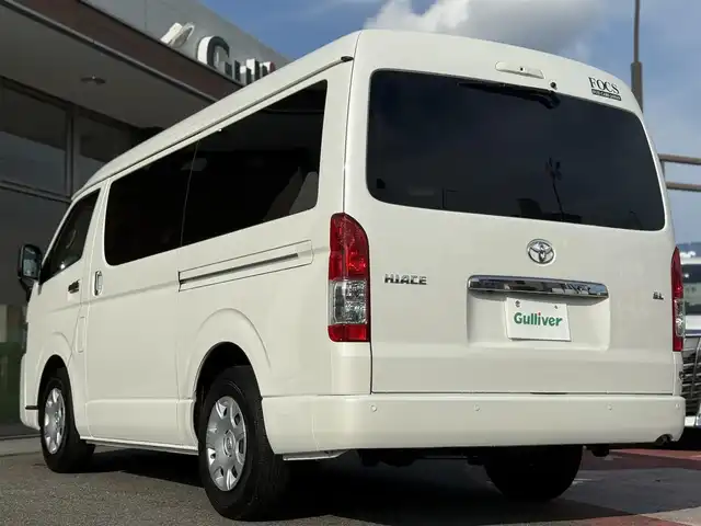 トヨタ ハイエース GL 香川県 2024(令6)年 0.4万km ホワイトパールクリスタルシャイン キャンピングカー/ストラーダSDナビ/フルセグ/CD/DVD/BT/デジタルインナーミラー/パノラミックビューモニター/セーフティセンス/プリクラッシュ/レーンキープ/オートハイビーム/シンク/ベットキット/サブバッテリー/外部１００Ｖ充電装置/電装配電盤/走行充電装置/100Vコンセント/照明/テーブル/カーテン/ＥＴＣ