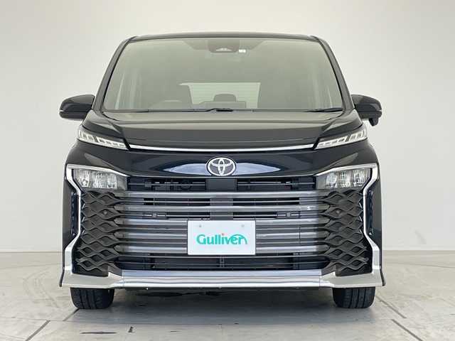トヨタ ヴォクシー S－G 愛知県 2022(令4)年 0.8万km アティチュードブラックマイカ 純正ディズプレイオーディオ　ナビ機能なし/両側パワースライドドア/レーダークルーズコントロール/シートヒーター/バックカメラ/コーナーセンサー/純正アルミホイール/LEDヘッドライト/リアオートエアコン/オートマチックハイビーム/ETC/衝突軽減システム/Bluetooth/ステアリングスイッチ/スマートキー/プッシュスタート