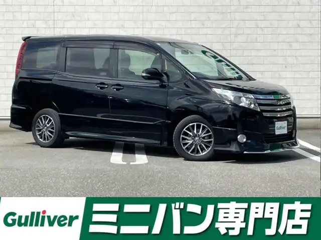 トヨタ ノア Si 福岡県 2015(平27)年 4.5万km ブラック 純正９型SDナビ(フルセグTV/CD/DVD/BT)バックカメラフリップダウンモニター両側パワスラドラレコETC純正LED純正アルミホイールプッシュスタートスマートキー