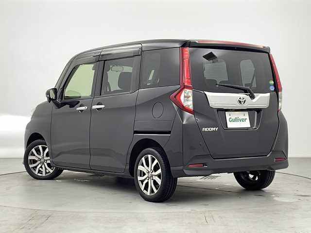 トヨタ ルーミー カスタムG－T 愛知県 2018(平30)年 6.5万km ブラックマイカメタリック /純正ナビ　NSZT-W68T//CD DVD BT フルセグTV SD FM AM//両側パワースライドドア　//クルーズコントロール　//ＥＴＣ　//バックカメラ　//衝突被害軽減システム　//ロールサンシェード//ドアバイザー//リアソナー//LEDヘッドライト//オートライト//純正フォグランプ//電動格納ウインカーミラー//スマートキー