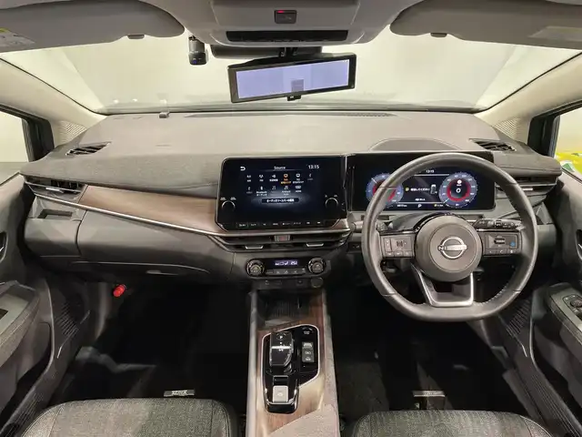 日産 オーラ G 愛知県 2024(令6)年 0.7万km ダークメタルグレー 純正９インチナビ/ＢＯＳＥサウンドシステム/プロパイロット/衝突軽減ブレーキ/ブラインドスポットモニター/クリアランスソナー/車線逸脱警報/ハーフレザーシート/ワイヤレス充電/デジタルインナーミラー/ドライブレコーダー/ビルトインＥＴＣ２．０/USB＆HDMI入力端子/アクセサリーソケット/LEDヘッドライト/ISOFIX/純正フロアマット/純正17インチアルミホイール