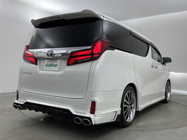 トヨタ アルファード S 兵庫県 2020(令2)年 3.3万km ホワイトパールクリスタルシャイン ・純正9インチナビ/・CD/DVD/AM/FM/・フルセグTV/・Bluetooth接続/・12.1インチフリップダウンモニター/・サンルーフ/・バックカメラ/・両側パワースライドドア/・ビルトインETC/・社外前後ドライブレコーダー/・HDMI接続/・2列目オットマン/・ZEUS製エアロ（フロント、サイド、リア）/・ZEUS製4本出しマフラー/・トヨタセーフティセンス/・プリクラッシュセーフティ/・レーンディパーチャーアラート/・クリアランスソナー/・パーキングサポートブレーキ/・ロードサインアシスト/・レーダークルーズコントロール/・オートマチックハイビーム/・社外フロアマット（M’Z SPEED）/・タナベローダウンサス/・電子パーキングブレーキ/・オートホールド/・