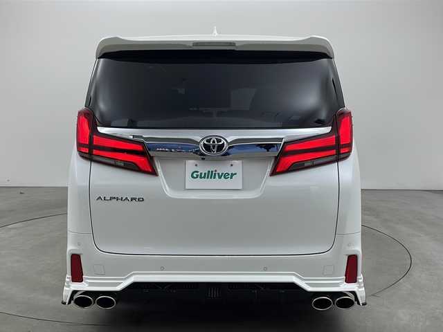 トヨタ アルファード S 兵庫県 2020(令2)年 3.3万km ホワイトパールクリスタルシャイン ・純正9インチナビ/・CD/DVD/AM/FM/・フルセグTV/・Bluetooth接続/・12.1インチフリップダウンモニター/・サンルーフ/・バックカメラ/・両側パワースライドドア/・ビルトインETC/・社外前後ドライブレコーダー/・HDMI接続/・2列目オットマン/・ZEUS製エアロ（フロント、サイド、リア）/・ZEUS製4本出しマフラー/・トヨタセーフティセンス/・プリクラッシュセーフティ/・レーンディパーチャーアラート/・クリアランスソナー/・パーキングサポートブレーキ/・ロードサインアシスト/・レーダークルーズコントロール/・オートマチックハイビーム/・社外フロアマット（M’Z SPEED）/・タナベローダウンサス/・電子パーキングブレーキ/・オートホールド/・