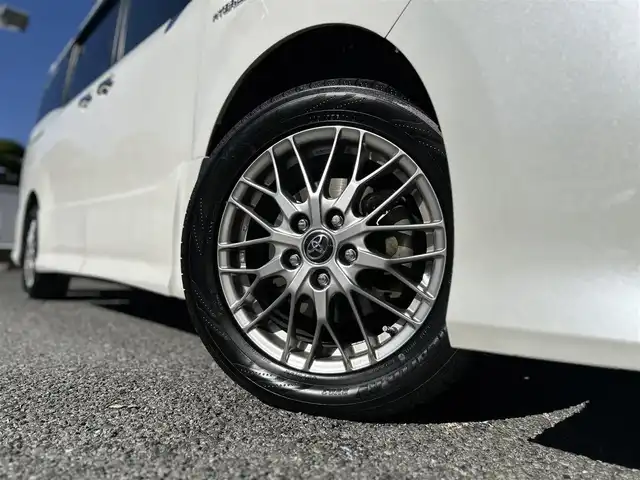 トヨタ ノア ハイブリッド Si ダブルバイビー 東京都 2018(平30)年 9.4万km ホワイトパールクリスタルシャイン ワンオーナー/純正SDナビ（NSZN-Z68T）/・Bluetoothオーディオ/フルセグTV/DVD/後席用モニター/ワンタッチスイッチ付両側パワースライドドア/リヤオートエアコン/シートヒーター（前席）/純正ビルトインETC2.0/Toyota Safety Sense/取扱説明書/保証書/スペアキー1本