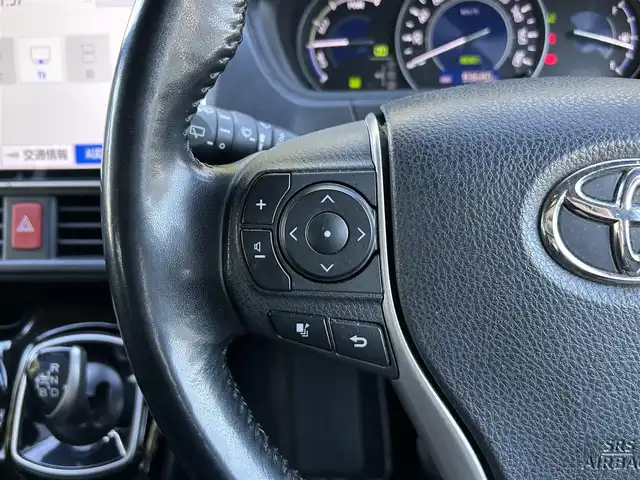 トヨタ ノア ハイブリッド Si ダブルバイビー 東京都 2018(平30)年 9.4万km ホワイトパールクリスタルシャイン ワンオーナー/純正SDナビ（NSZN-Z68T）/・Bluetoothオーディオ/フルセグTV/DVD/後席用モニター/ワンタッチスイッチ付両側パワースライドドア/リヤオートエアコン/シートヒーター（前席）/純正ビルトインETC2.0/Toyota Safety Sense/取扱説明書/保証書/スペアキー1本