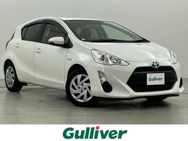 トヨタ アクア S 福岡県 2015(平27)年 5.5万km ライムホワイトパールクリスタルシャイン 純正ナビ（Ｂｌｕｅｔｏｏｔｈ，フルセグＴＶ）　/バックカメラ　/ＥＴＣ　/横滑り防止装置　/アイドリングストップ　/ＥＣＯモード　/電動格納式ドアミラー　/プッシュスタート　/ステアリングリモコン　/ＬＥＤヘッドライト