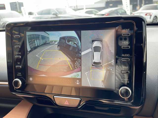 トヨタ ヤリス ハイブリッド Z 新潟県 2020(令2)年 5.6万km ホワイト/センシュアルレッドマイカ 9インチオプションナビ/Bluetooth/パートタイム4WD/衝突軽減/自動駐車/クリアランスソナー/レーンキープアシスト（操舵支援あり）/レーダークルーズコントロール/BSM/ドライブレコーダー/全方位カメラ/ETC2.0ビルドイン/レザーシートカバー/前席シートヒーター/フロアマット/LEDヘッドライト/フォグランプ/ウィンカーミラー/電格ミラー/ドアバイザー/スペアキー×１