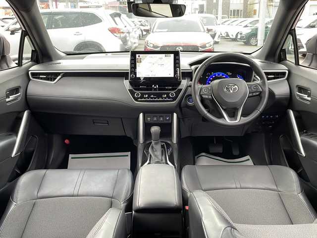 トヨタ カローラ クロス ハイブリッド Z 道北・旭川 2021(令3)年 4.1万km アティチュードブラックマイカ ・４WD/・寒冷地仕様/・禁煙車/・純正9インチディスプレイオーディオBT/USB/ミラーキャスト/・パノラミックビューモニター/・ブラインドスポットモニター/・前席シートヒーター/・D席パワーシート/・LEDフォグライト/・トヨタセーフティセンス/・プリクラッシュセーフティ/・レーントレーニングアシスト/・レーンディパーチャーアラート/・レーダークルーズコントロール/・オートマチックハイビーム/・プロアクティブドライビングアシスト/・発射遅れ告知機能/・電動リアゲート/・前後コーナーセンサー/・ステアリングヒーター/・ミラーヒーター/・純正前方ドライブレコーダー/・ルーフレール/・LEDヘッドライト/・オートライト/・ビルトインETC/・スペアキー1本/・保証書