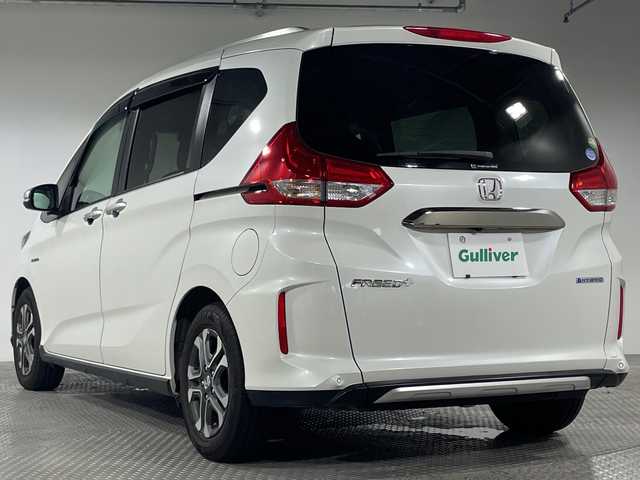ホンダ フリード ハイブリット クロスター ホンダセンシング 神奈川県 2020(令2)年 4.1万km プラチナホワイトパール ホンダセンシング/純正9インチナビ/・BT/フルセグTV/SD/CD/DVD/AM/FM/バックカメラ/ハーフレザーシート/シートヒーター(D/N)/シートリフター/両側電動スライドドア/ビルトインETC/フロントデアイサー/革巻きステアリング/ステアリングスイッチ/Autoライト/フォグランプ/前後ドライブレコーダー/スマートキー/プッシュスタートボタン/電動格納ミラー/ウィンカーミラー/LEDヘッドライト/純正ドアバイザー/純正フロアマット/純正アルミホイール