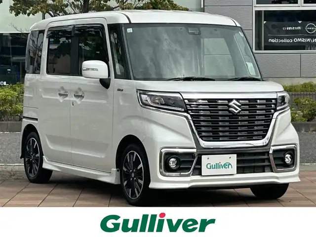 スズキ スペーシア カスタム HYBRID XS ターボ 福島県 2019(令1)年 2.4万km ピュアホワイトP デュアルセンサーブレーキサポート/クルーズコントロール/車線逸脱支援システム/純正ナビゲーション/型番：KXM-E504W/【CD/DVD/SD/USB/BT/TV】/バックカメラ/ビルトインETC/ドライブレコーダー/両側電動スライドドア/運転席シートヒーター/ステアリングリモコン/パドルシフト/アイドリングストップ/リアサーキュレーター/リアドアロールサンシェード/シートバックテーブル/LEDオートライト/LEDフォグランプ/純正フロアマット/純正ドアバイザー