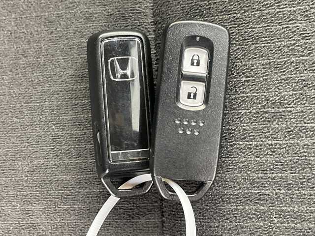 ホンダ Ｎ ＯＮＥ プレミアム ツアラー 岐阜県 2021(令3)年 2.7万km プレミアムアイボリーパールⅡ 純正ナビ/　(DISC/USB/AM/FM/Bluetooth)/バックカメラ/衝突軽減ブレーキ/レーンキープアシスト/コーナーセンサー/レーダークルーズコントロール/ハーフレザーシート/シートヒーター/純正ドライブレコーダー/ビルトインETC/LEDヘッドライト/純正アルミホイール/純正フロアマット