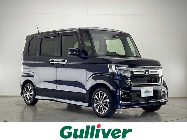 ホンダ Ｎ ＢＯＸ カスタム L 宮崎県 2023(令5)年 0.9万km ミッドナイトブルービームM 禁煙車/ホンダセンシング/純正8型ナビTV/（VXM-215VFEi/CD/DVD/Bluetooth/フルセグTV)/純正バックカメラ/純正ドライブレコーダー/純正LEDオートライト/純正LEDフォグ/純正14インチアルミ/純正エアロ/純正ルーフエンドスポイラー/純正フロアマット/両側電動スライドドア/アダプティブクルーズコントロール/レーンディパーチャーアラート/クリアランスソナー/オートエアコン（プラズマクラスター）/前席シートヒーター/ウインカードアミラー/ETC/スマートキー/プッシュエンジンスタート/スペアキー/新車時保証書/取扱い説明書