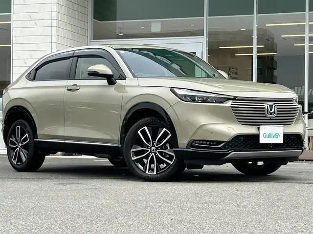 ホンダ ヴェゼル ハイブリッド e:HEV Z 兵庫県 2021(令3)年 0.8万km サンドカーキパール 全方位カメラ/クルーズコントロール/ドラレコ/ビルトイン2.0ETC/ハンズフリーパワーバックドア/衝突軽減システム/純正ナビ/フルセグTV/パドルシフト/ブラインドスポットインフォメーション/LEDヘッドライト/フォグランプ/buluetooth接続