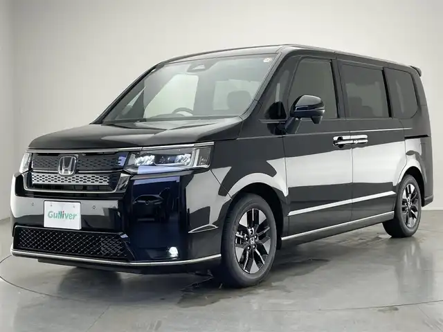 ホンダ ステップワゴン スパーダ eHEV 愛知県 2025(令7)年 0.1万km未満 クリスタルブラックパール 登録済未使用車/純正11.4型ナビ/フルセグTV/Blutooth/バックカメラ/後席モニター/両側パワースライドドア/パワーバックドア/BSM/ホンダセンシング/レーダークルーズコントロール/LEDヘッドライト/ハーフレザーシート/－－－－－－－－－－－－－－－－－/スパーダ　e:HEV　3CJ4AZ　11.4インチナビHonda CONNECTナビ LXM-247VFLi(317900円)