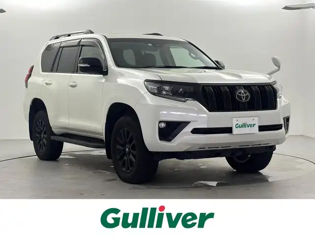 トヨタ ランドクルーザー プラド TX Lパッケージ マットブラED 福井県 2023(令5)年 0.6万km ホワイトパールクリスタルシャイン 純正９型ナビ/（Ｂｌｕｅｔｏｏｔｈ／ＴＶ／ＣＤ／ＤＶＤ/フルセグ）/バックカメラ/サンルーフ/ルーフレール/純正１８インチアルミホイール/純正ビルトインＥＴＣ/スマートキー/トヨタセーフティセンス/前後コーナーセンサー/ガナドールマフラー