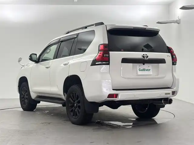 トヨタ ランドクルーザー プラド TX Lパッケージ マットブラED 福井県 2023(令5)年 0.6万km ホワイトパールクリスタルシャイン 純正９型ナビ/（Ｂｌｕｅｔｏｏｔｈ／ＴＶ／ＣＤ／ＤＶＤ/フルセグ）/バックカメラ/サンルーフ/ルーフレール/純正１８インチアルミホイール/純正ビルトインＥＴＣ/スマートキー/トヨタセーフティセンス/前後コーナーセンサー/ガナドールマフラー