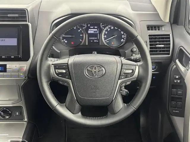 トヨタ ランドクルーザー プラド TX Lパッケージ マットブラED 福井県 2023(令5)年 0.6万km ホワイトパールクリスタルシャイン 純正９型ナビ/（Ｂｌｕｅｔｏｏｔｈ／ＴＶ／ＣＤ／ＤＶＤ/フルセグ）/バックカメラ/サンルーフ/ルーフレール/純正１８インチアルミホイール/純正ビルトインＥＴＣ/スマートキー/トヨタセーフティセンス/前後コーナーセンサー/ガナドールマフラー