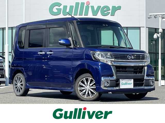 ダイハツ タント カスタム X トップED SA Ⅲ 佐賀県 2017(平29)年 6.9万km ディープブルークリスタルマイカ 社外7型ナビゲーション「MDV-D404BT」/・AM/FM/BT/CD/DVD/フルセグ//・バックカメラ/片側パワースライドドア/USB入力端子/スマートキー/・スペアキー1本/LEDヘッドライト/・オートマチックハイビーム/黒ハーフレザーシート/シートヒーター「運転席/」/ドアバイザー/ミラクルオープンドアー/・スマートアシストIII/・衝突回避支援ブレーキ機能（対車両・対歩行者）/・衝突警報機能（対車両・対歩行者）/・誤発進抑制制御機能（前方・後方）/・VSC（車両安定制御システム）/・TRC（トラクションコントロール）/・ABS（EBD付）/・ヒルホールドシステム（坂道発進補助）/・エマージェンシーストップシグナル（急ブレーキ時にハザード点滅）