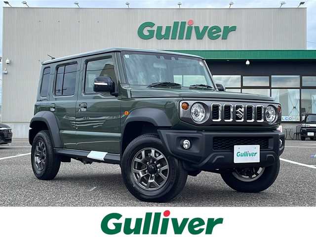 スズキ ジムニー ノマド FC 島根県 2025(令7)年 0.1千km 緑 オーディオレス/スズキセーフティサポート/レーダークルーズコントロール/D/N席シートヒーター/ヘッドライトウォッシャー/LEDヘッドライト/AUTOライト/オートマチックハイビーム/フォグライト/コーナーセンサー/アイドリングストップ/ISOFIX/電動格納ミラー/ウィンカーミラー/純正15インチアルミホイール