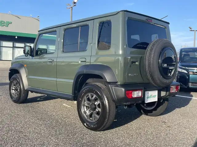 スズキ ジムニー ノマド FC 島根県 2025(令7)年 0.1千km 緑 オーディオレス/スズキセーフティサポート/レーダークルーズコントロール/D/N席シートヒーター/ヘッドライトウォッシャー/LEDヘッドライト/AUTOライト/オートマチックハイビーム/フォグライト/コーナーセンサー/アイドリングストップ/ISOFIX/電動格納ミラー/ウィンカーミラー/純正15インチアルミホイール