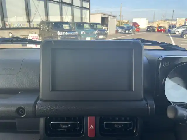 スズキ ジムニー ノマド FC 島根県 2025(令7)年 0.1千km 緑 オーディオレス/スズキセーフティサポート/レーダークルーズコントロール/D/N席シートヒーター/ヘッドライトウォッシャー/LEDヘッドライト/AUTOライト/オートマチックハイビーム/フォグライト/コーナーセンサー/アイドリングストップ/ISOFIX/電動格納ミラー/ウィンカーミラー/純正15インチアルミホイール