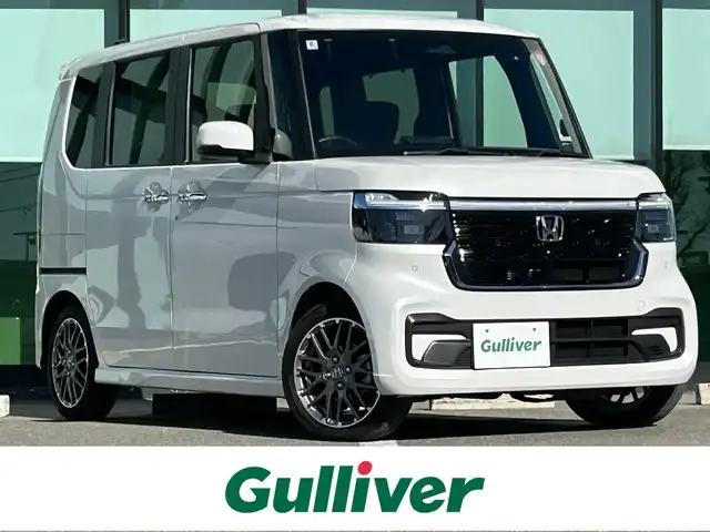 ホンダ Ｎ ＢＯＸ カスタム ターボ 和歌山県 2024(令6)年 1万km プラチナホワイトパール 純正9インチナビ/バックカメラ/フルセグTV/衝突軽減ブレーキ/前後コーナーセンサー/レーダークルコン/オートライト/シートヒーター/両側パワスラ/電動パーキング/オートホールド/ステリモ/LEDヘッドライト/パドルシフト/ハーフレザーシート/後席サンシェード