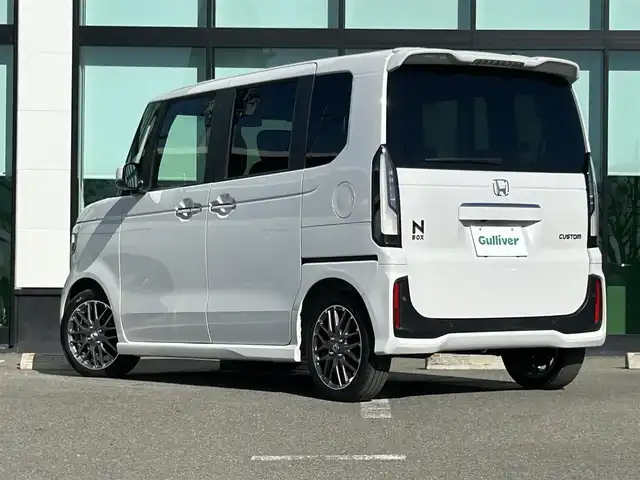 ホンダ Ｎ ＢＯＸ カスタム ターボ 和歌山県 2024(令6)年 1万km プラチナホワイトパール 純正9インチナビ/バックカメラ/フルセグTV/衝突軽減ブレーキ/前後コーナーセンサー/レーダークルコン/オートライト/シートヒーター/両側パワスラ/電動パーキング/オートホールド/ステリモ/LEDヘッドライト/パドルシフト/ハーフレザーシート/後席サンシェード