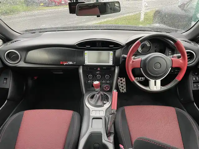 トヨタ ８６ GT 兵庫県 2012(平24)年 7.4万km ダークグレーメタリック 純正ナビ/・CD/・AM/FM/バックカメラ/ETC/TRDフロントエアロ/TRDダックテール/HKSマフラー/HKS車高調/HKSサクションパイプ/社外エキマニ/AT付きMT/アルミペダル/純正フロアマット/オートライト/前後ドラレコ/電格ミラー