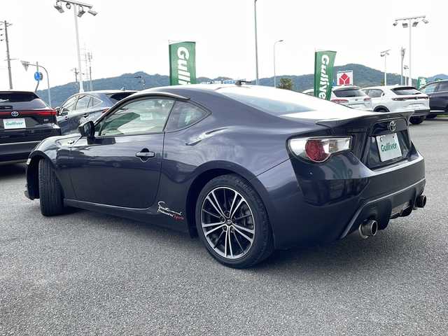 トヨタ ８６ GT 兵庫県 2012(平24)年 7.4万km ダークグレーメタリック 純正ナビ/・CD/・AM/FM/バックカメラ/ETC/TRDフロントエアロ/TRDダックテール/HKSマフラー/HKS車高調/HKSサクションパイプ/社外エキマニ/AT付きMT/アルミペダル/純正フロアマット/オートライト/前後ドラレコ/電格ミラー