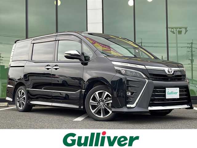 トヨタ ヴォクシー ZS 煌Ⅱ 福岡県 2020(令2)年 5.2万km ブラック 純正9インチSDナビ/（CD/DVD/BT/フルセグTV）/衝突軽減ブレーキシステム/バックカメラ/ステアリングスイッチ/両側電動スライドドア/ビルトインETC/前後ドライブレコーダー/LEDヘッドライト/LEDフォグランプ/オートハイビーム/オートライト/クルーズコントロール/後席サンシェイド/シートバックテーブル/D席シートリフター/スマートキー×2/取扱説明書/ナビ取扱説明書