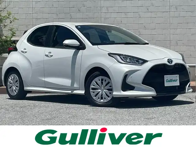 トヨタ ヤリス ハイブリッド Z 滋賀県 2023(令5)年 0.1万km プラチナホワイトパールマイカ ワンオーナー/純正ナビ/(AM/FM/BT/USB)/ブラインドスポットモニター/全方位モニター/ETC2.0(ビルトイン)/前後ドライブレコーダー/シートヒーター/クリアランスソナー/トヨタセーフティセンス/・プリクラッシュセーフティ/・レーントレーシングアシスト/・オートマチックハイビーム/クルーズコントロール/ステアリングヒーター/革巻きステアリング/ステアリングスイッチ/横滑り防止装置/オートライト/LEDヘッドライト/フロアマット/電動格納ミラー/プッシュスタート/EVモード/スペアキー