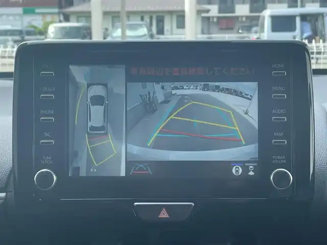 トヨタ ヤリス ハイブリッド Z 滋賀県 2023(令5)年 0.1万km プラチナホワイトパールマイカ ワンオーナー/純正ナビ/(AM/FM/BT/USB)/ブラインドスポットモニター/全方位モニター/ETC2.0(ビルトイン)/前後ドライブレコーダー/シートヒーター/クリアランスソナー/トヨタセーフティセンス/・プリクラッシュセーフティ/・レーントレーシングアシスト/・オートマチックハイビーム/クルーズコントロール/ステアリングヒーター/革巻きステアリング/ステアリングスイッチ/横滑り防止装置/オートライト/LEDヘッドライト/フロアマット/電動格納ミラー/プッシュスタート/EVモード/スペアキー