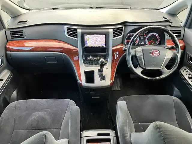 トヨタ アルファード 240S プライムセレクションⅡ 静岡県 2010(平22)年 9.5万km ブラック エンジンスタートボタン/パワーステアリング/パワーウィンドウ/スマートキー/Wオートエアコン/ALPINE製後席モニター/ETC/バックカメラ/SDナビ（CD/DVD/BT/フルセグ）/三列シート/オットマン/電動リアゲート/ウォークスルー/純正フロアマット/純正アルミホイール/両側パワースライドドア/布シート/ABS/横滑り防止装置/コーナーセンサー前後/オートライト/W+サイドエアバッグ/カーテンエアバッグ