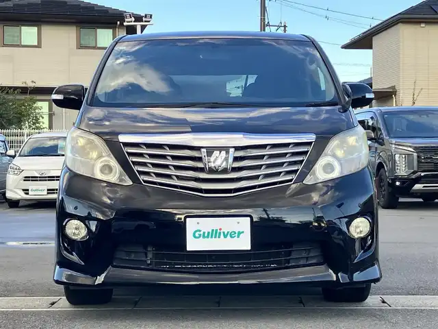 トヨタ アルファード 240S プライムセレクションⅡ 静岡県 2010(平22)年 9.5万km ブラック エンジンスタートボタン/パワーステアリング/パワーウィンドウ/スマートキー/Wオートエアコン/ALPINE製後席モニター/ETC/バックカメラ/SDナビ（CD/DVD/BT/フルセグ）/三列シート/オットマン/電動リアゲート/ウォークスルー/純正フロアマット/純正アルミホイール/両側パワースライドドア/布シート/ABS/横滑り防止装置/コーナーセンサー前後/オートライト/W+サイドエアバッグ/カーテンエアバッグ