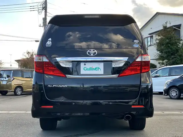 トヨタ アルファード 240S プライムセレクションⅡ 静岡県 2010(平22)年 9.5万km ブラック エンジンスタートボタン/パワーステアリング/パワーウィンドウ/スマートキー/Wオートエアコン/ALPINE製後席モニター/ETC/バックカメラ/SDナビ（CD/DVD/BT/フルセグ）/三列シート/オットマン/電動リアゲート/ウォークスルー/純正フロアマット/純正アルミホイール/両側パワースライドドア/布シート/ABS/横滑り防止装置/コーナーセンサー前後/オートライト/W+サイドエアバッグ/カーテンエアバッグ