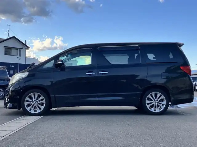 トヨタ アルファード 240S プライムセレクションⅡ 静岡県 2010(平22)年 9.5万km ブラック エンジンスタートボタン/パワーステアリング/パワーウィンドウ/スマートキー/Wオートエアコン/ALPINE製後席モニター/ETC/バックカメラ/SDナビ（CD/DVD/BT/フルセグ）/三列シート/オットマン/電動リアゲート/ウォークスルー/純正フロアマット/純正アルミホイール/両側パワースライドドア/布シート/ABS/横滑り防止装置/コーナーセンサー前後/オートライト/W+サイドエアバッグ/カーテンエアバッグ