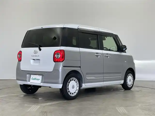 ダイハツ ムーヴ キャンバス ストライプス G 埼玉県 2023(令5)年 1.7万km シャイニングホワイトパール/スムーズグレーマイカメタリック 純正10インチナビ/CD DVD 地デジTV　Bluetooth HDMI/バックカメラ/衝突軽減ブレーキ/両側パワースライドドア/ドライブレコーダー/ワイヤレス充電器/シートヒーター/ホッとカップホルダー/LEDオートライト/オートハイビーム/ETC