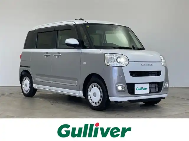 ダイハツ ムーヴ キャンバス ストライプス G 埼玉県 2023(令5)年 1.7万km シャイニングホワイトパール/スムーズグレーマイカメタリック 純正10インチナビ/CD DVD 地デジTV　Bluetooth HDMI/バックカメラ/衝突軽減ブレーキ/両側パワースライドドア/ドライブレコーダー/ワイヤレス充電器/シートヒーター/ホッとカップホルダー/LEDオートライト/オートハイビーム/ETC