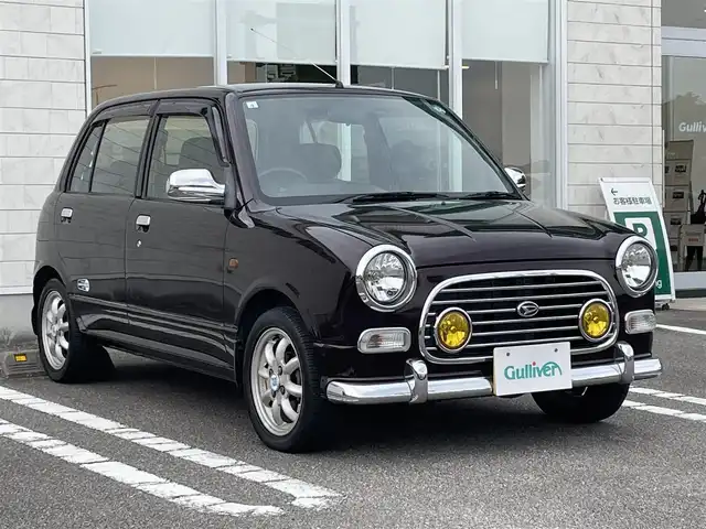 ダイハツ ミラ ジーノ ミニライトスペシャル 宮崎県 2001(平13)年 11.4万km ワインレッドマイカ 同色全塗装【R30ワインレッドマイカ】/2WAY BASS-REFLEX SPEAKER/社外オーディオ【clarion製】/・CD・ラジオ・USB/純正フロアマット/パワーウィンドウ【D席オート】/純正14インチアルミホイール/スペアキー有り