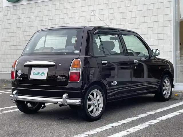 ダイハツ ミラ ジーノ ミニライトスペシャル 宮崎県 2001(平13)年 11.4万km ワインレッドマイカ 同色全塗装【R30ワインレッドマイカ】/2WAY BASS-REFLEX SPEAKER/社外オーディオ【clarion製】/・CD・ラジオ・USB/純正フロアマット/パワーウィンドウ【D席オート】/純正14インチアルミホイール/スペアキー有り