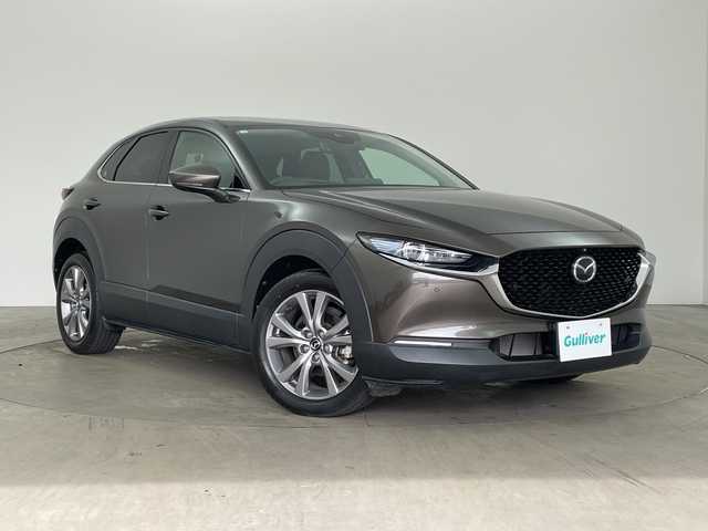 マツダ ＣＸ－３０ 20S Lパッケージ 兵庫県 2020(令2)年 2.1万km チタニウムフラッシュマイカ ・i-ACTIVSENSE/・スマートブレーキサポート/・スマートブレーキサポート（後進時）/・車間制御/・レーダークルーズコントロール/・オートマチックハイビーム/・速度標識警報/・ドライバーモニタリング/・前側方接近車両検知/・後側方接近車両検知/・車線逸脱警報システム/・ブラインドスポットモニター/・レーンキープアシストシステム/・前後パーキングセンサー/・純正8.8型SDナビ＆TV＆BT＆USB＆DVD/・360°カメラ/・黒革シート/・前席パワーシート/・前席シートヒーター/・運転席メモリーシート/・アイドリングストップ/・横滑り防止装置/・パワーバックドア/・革巻きステアリング/・ステアリングスイッチ/・ステアリングヒーター/・純正フロアマット/・電子パーキング/・オートホールド/・スマートキー/・プッシュスタート/・ビルトインETC/・電動格納ミラー/・LEDヘッドライト/・オートライト/・純正18インチアルミホイール