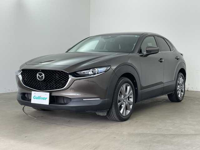 マツダ ＣＸ－３０ 20S Lパッケージ 兵庫県 2020(令2)年 2.1万km チタニウムフラッシュマイカ ・i-ACTIVSENSE/・スマートブレーキサポート/・スマートブレーキサポート（後進時）/・車間制御/・レーダークルーズコントロール/・オートマチックハイビーム/・速度標識警報/・ドライバーモニタリング/・前側方接近車両検知/・後側方接近車両検知/・車線逸脱警報システム/・ブラインドスポットモニター/・レーンキープアシストシステム/・前後パーキングセンサー/・純正8.8型SDナビ＆TV＆BT＆USB＆DVD/・360°カメラ/・黒革シート/・前席パワーシート/・前席シートヒーター/・運転席メモリーシート/・アイドリングストップ/・横滑り防止装置/・パワーバックドア/・革巻きステアリング/・ステアリングスイッチ/・ステアリングヒーター/・純正フロアマット/・電子パーキング/・オートホールド/・スマートキー/・プッシュスタート/・ビルトインETC/・電動格納ミラー/・LEDヘッドライト/・オートライト/・純正18インチアルミホイール