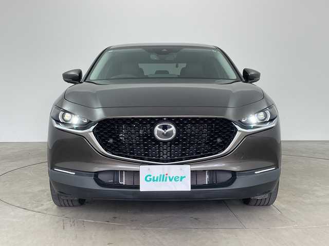 マツダ ＣＸ－３０ 20S Lパッケージ 兵庫県 2020(令2)年 2.1万km チタニウムフラッシュマイカ ・i-ACTIVSENSE/・スマートブレーキサポート/・スマートブレーキサポート（後進時）/・車間制御/・レーダークルーズコントロール/・オートマチックハイビーム/・速度標識警報/・ドライバーモニタリング/・前側方接近車両検知/・後側方接近車両検知/・車線逸脱警報システム/・ブラインドスポットモニター/・レーンキープアシストシステム/・前後パーキングセンサー/・純正8.8型SDナビ＆TV＆BT＆USB＆DVD/・360°カメラ/・黒革シート/・前席パワーシート/・前席シートヒーター/・運転席メモリーシート/・アイドリングストップ/・横滑り防止装置/・パワーバックドア/・革巻きステアリング/・ステアリングスイッチ/・ステアリングヒーター/・純正フロアマット/・電子パーキング/・オートホールド/・スマートキー/・プッシュスタート/・ビルトインETC/・電動格納ミラー/・LEDヘッドライト/・オートライト/・純正18インチアルミホイール