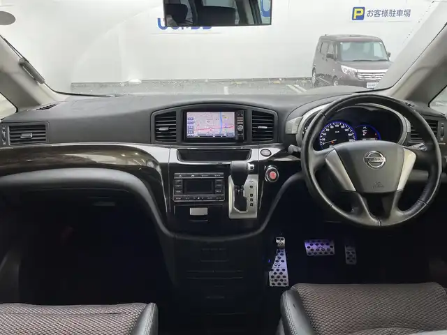 日産 エルグランド 250HWS アーバンクロム 埼玉県 2012(平24)年 12万km ファントムブラック (株)IDOMが運営する【じしゃロン鳩ヶ谷店】の自社ローン専用車両になりますこちらは現金またはオートローンご利用時の価格です。自社ローンご希望の方は別途その旨お申付け下さい/純正ナビ/フルセグTV/（CD/DVD/BT/AUX/AM/FM）/両側パワースライドドア/ETC/ハーフレザーシート/オットマン/スマートキー/プッシュスタート/社外アルミホイール/純正フロアマット/ドアバイザー/オートライト/フォグランプ
