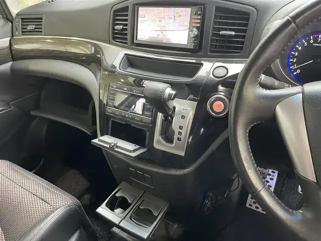日産 エルグランド 250HWS アーバンクロム 埼玉県 2012(平24)年 12万km ファントムブラック (株)IDOMが運営する【じしゃロン鳩ヶ谷店】の自社ローン専用車両になりますこちらは現金またはオートローンご利用時の価格です。自社ローンご希望の方は別途その旨お申付け下さい/純正ナビ/フルセグTV/（CD/DVD/BT/AUX/AM/FM）/両側パワースライドドア/ETC/ハーフレザーシート/オットマン/スマートキー/プッシュスタート/社外アルミホイール/純正フロアマット/ドアバイザー/オートライト/フォグランプ
