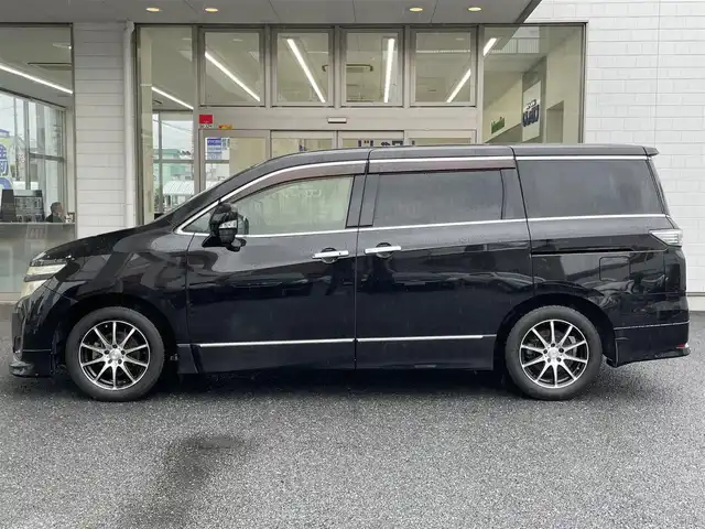 日産 エルグランド 250HWS アーバンクロム 埼玉県 2012(平24)年 12万km ファントムブラック (株)IDOMが運営する【じしゃロン鳩ヶ谷店】の自社ローン専用車両になりますこちらは現金またはオートローンご利用時の価格です。自社ローンご希望の方は別途その旨お申付け下さい/純正ナビ/フルセグTV/（CD/DVD/BT/AUX/AM/FM）/両側パワースライドドア/ETC/ハーフレザーシート/オットマン/スマートキー/プッシュスタート/社外アルミホイール/純正フロアマット/ドアバイザー/オートライト/フォグランプ
